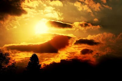 Low angle view of cloudy sky at sunset