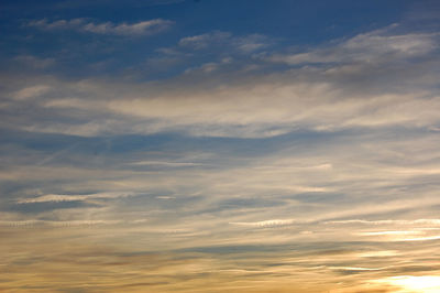 Low angle view of clouds in sky during sunset