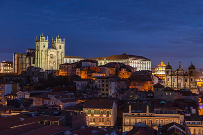 Buildings in city against sky