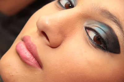 Close-up portrait of woman with eyeshadow