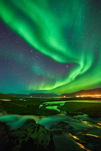 Aurora borealis dancing over the sky