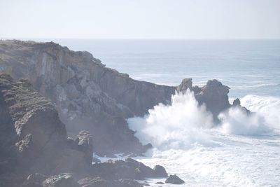 Scenic view of sea against clear sky