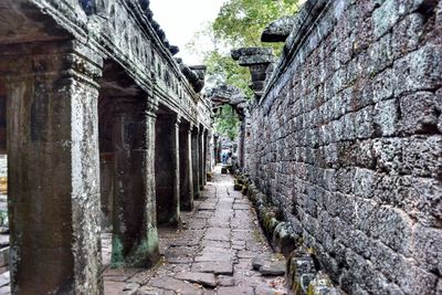 Cobblestone street amidst buildings