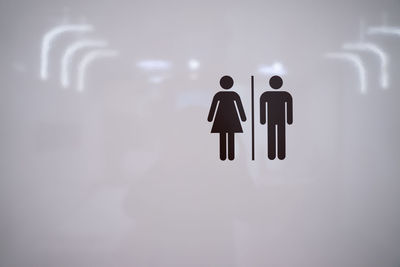 Low angle view of statues against sky