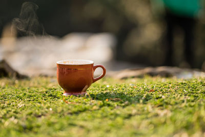 Close-up of hot coffee cup