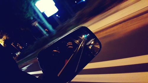 Close-up of illuminated motorcycle