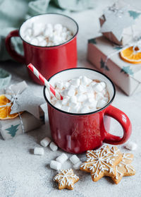 Cozy winter and christmas setting with hot cocoa and homemade cookies