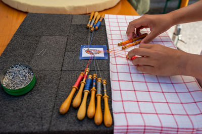 Cropped image of person working on table