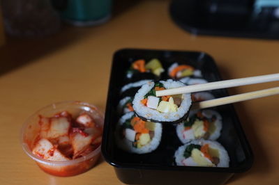 Close-up of sushi served on table