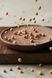 Close-up of nuts falling on table