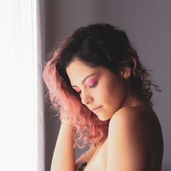 Portrait of beautiful woman at home