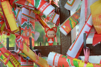 Close-up of multi colored umbrellas hanging on clothesline