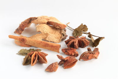 Close-up of fruits against white background