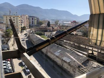 High angle view of buildings and mountains against sky