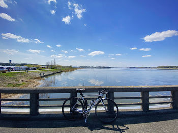 Scenic view of lake against blue sky