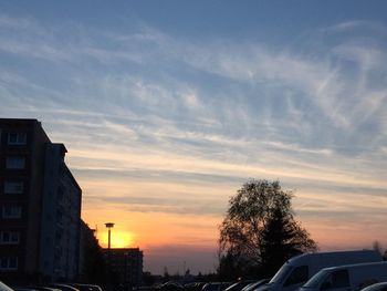 Buildings against sky during sunset