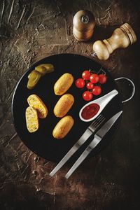 High angle view of fruits in container on table