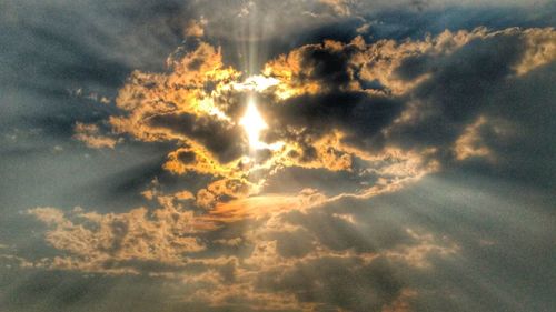 Low angle view of clouds in sky during sunset