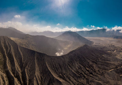 Scenic view of volcanic landscape against sky