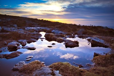 Scenic view of rocks against sky during winter