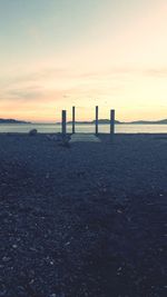 Scenic view of sea against sky at sunset