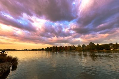 Scenic view of sea against sky at sunset