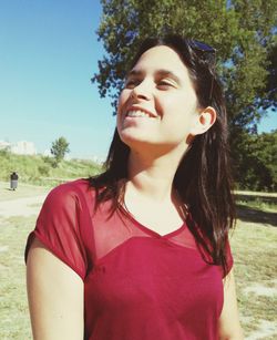 Portrait of young woman looking away