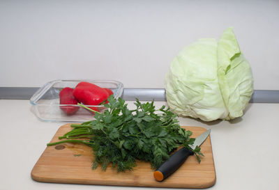 Fruits and vegetables on cutting board
