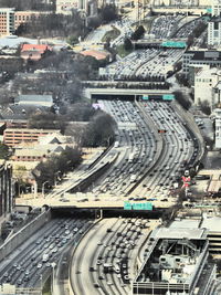 Aerial view of vehicles on road in city