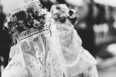 Ancient carnival of sauris. traditional wooden masks. black and white. italy