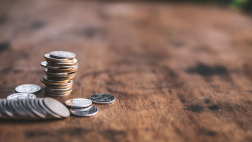 Close-up of coins on table