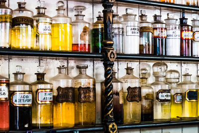 Bottles on shelf at store