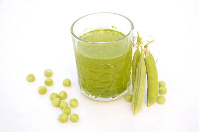 High angle view of drink against white background