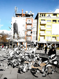 People in front of building