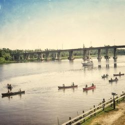 Scenic view of bridge over river against sky