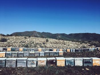 Buildings against clear blue sky