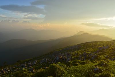 Scenic view of landscape against sky during sunset