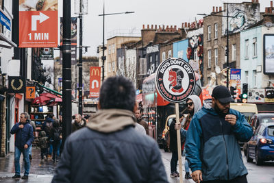 People on street in city