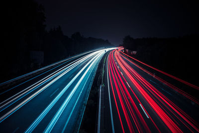 High angle view of light trails on highway