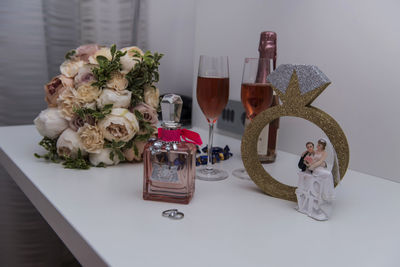 Close-up of roses in vase on table