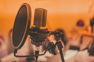 Close-up of microphone in recording studio