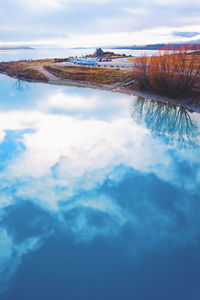 Scenic view of sea against cloudy sky