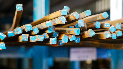 Close-up of multi colored metal in shelves