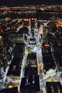 Aerial view of illuminated city at night