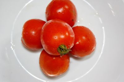High angle view of cherries in plate