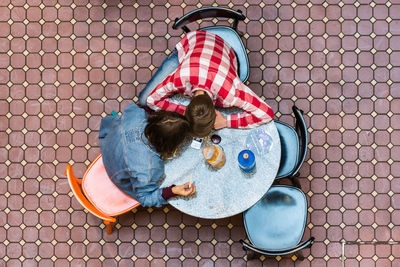 Directly above shot of girl playing outdoors
