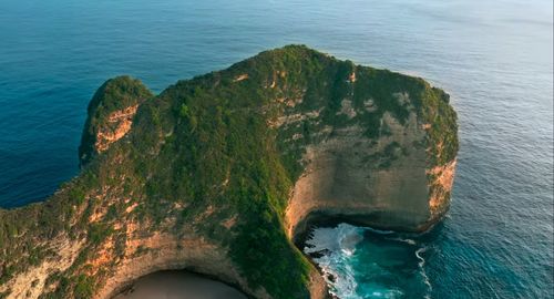 High angle view of rocks on sea