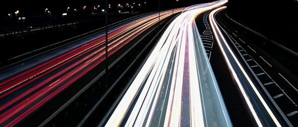 Light trails on city street at night