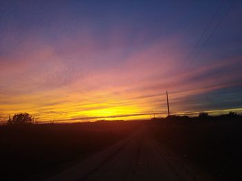 Scenic view of silhouette landscape against sky during sunset