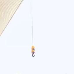 Low angle view of electric lamp against white background